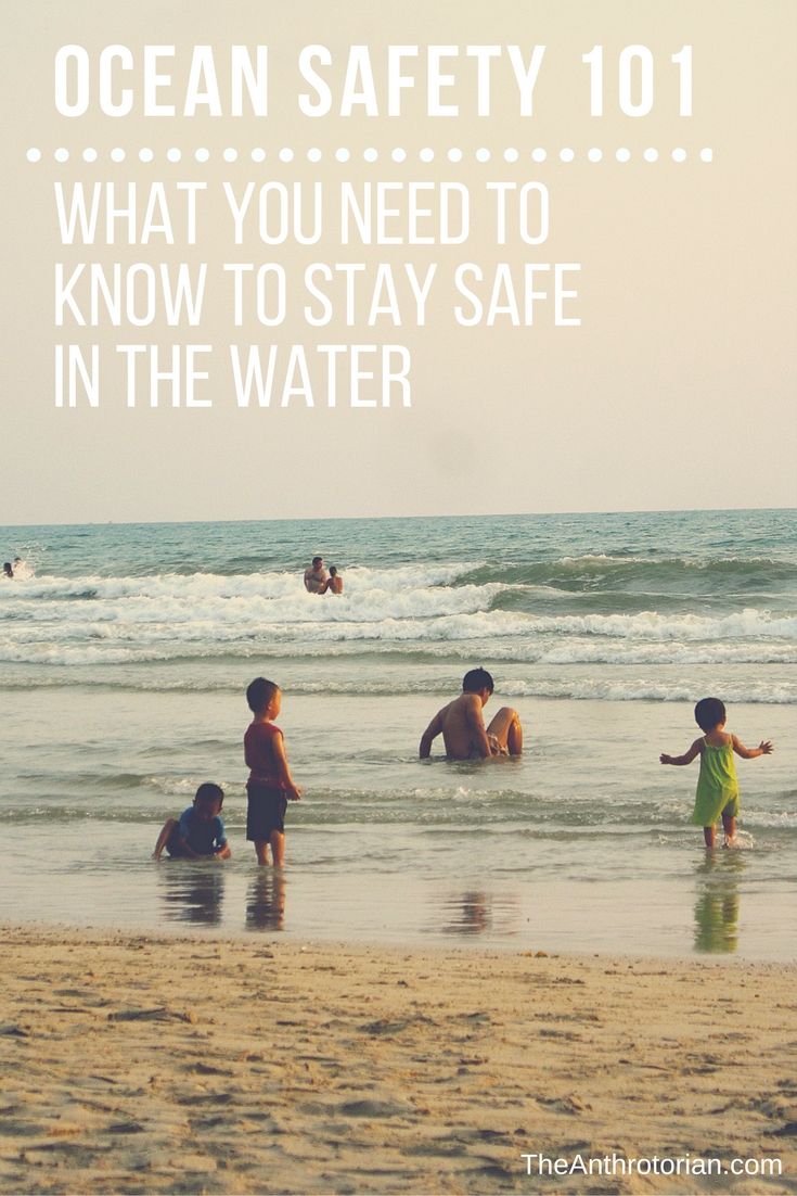 This may contain: children playing in the water at the beach with an ocean safety 101 quote on it