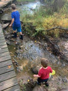 A picture containing outdoor, child, child, little

Description automatically generated