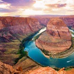 A river running through a canyon
Description automatically generated with low confidence