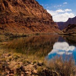 A picture containing mountain, outdoor, grass, nature
Description automatically generated