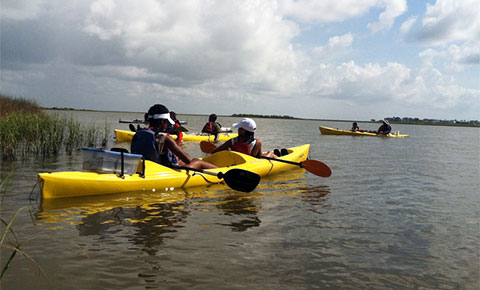 photo of kayakers on the water