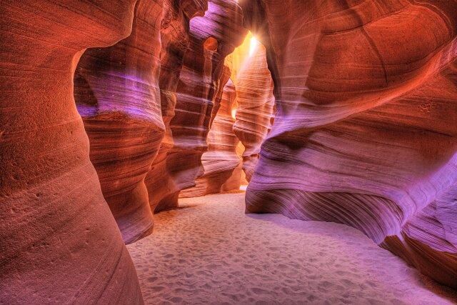A picture containing indoor, nature, valley, canyon

Description automatically generated