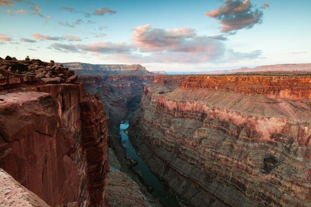 A canyon with a river running through it
Description automatically generated with medium confidence