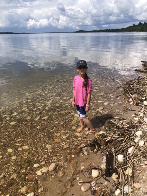 Kids out finding new rocks to add to their nature collections.