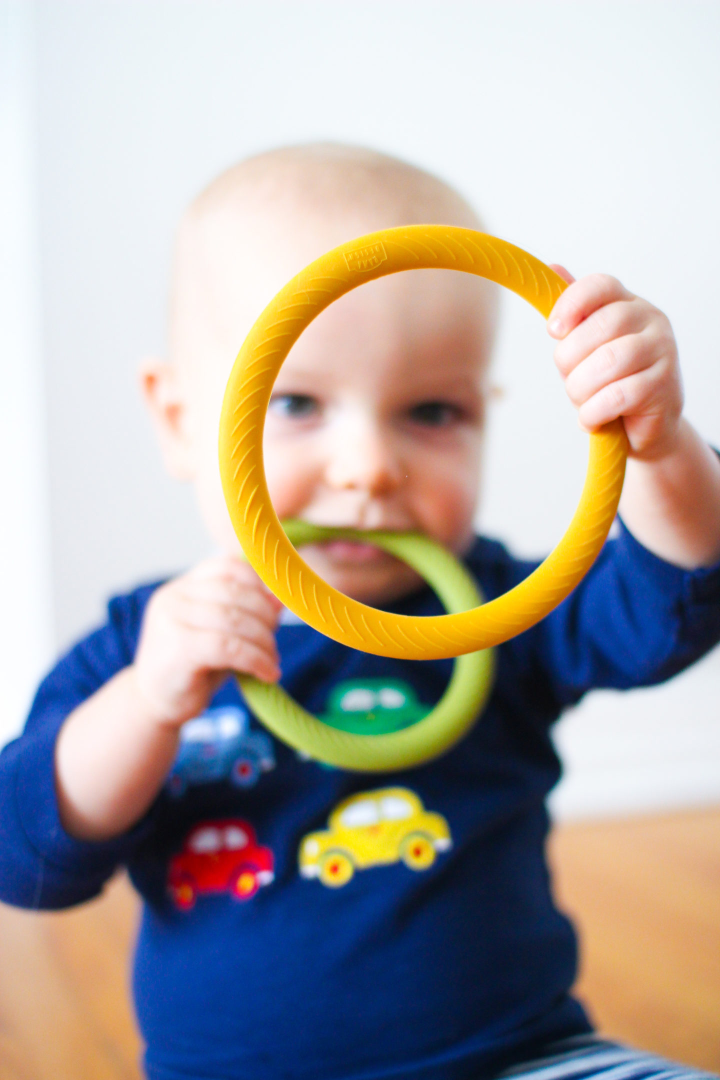 baby playing with loose parts