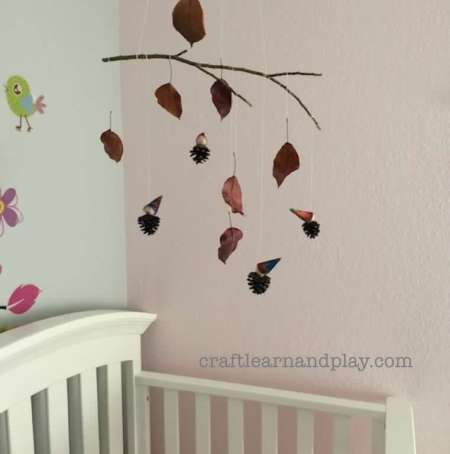 Simple DIY nature mobile with leaves and pinecones