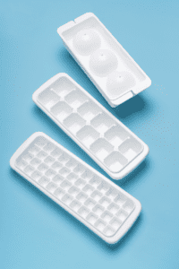 three different ice cube trays to make different shape ice cubes for toddlers to play with