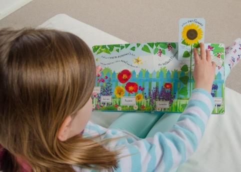 child reading a picture book