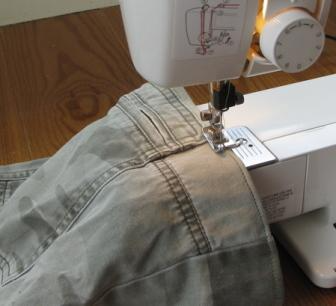 A picture containing text, appliance, sewing machine, indoor

Description automatically generated